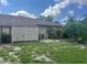 Condo with a fenced patio and landscaped yard at 4210 66Th Street W Cir, Bradenton, FL 34209