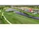 Aerial view of condo community near golf course and lake at 17724 Gawthrop Dr # 201, Bradenton, FL 34211