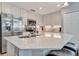 Modern kitchen with stainless steel appliances and island at 17724 Gawthrop Dr # 201, Bradenton, FL 34211