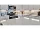 Modern kitchen with stainless steel appliances and white cabinets at 17724 Gawthrop Dr # 201, Bradenton, FL 34211