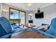 Living room with sectional sofa and view of golf course at 17724 Gawthrop Dr # 201, Bradenton, FL 34211