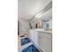 Elegant bathroom with double vanity and large mirror at 17724 Gawthrop Dr # 201, Bradenton, FL 34211