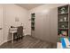 Well-designed home office with built-in storage at 8269 Enclave Way # 103, Sarasota, FL 34243