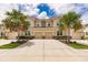 Front view of two-story townhouses at 8269 Enclave Way # 103, Sarasota, FL 34243