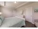 Bright bedroom featuring a comfortable bed and ample space at 8269 Enclave Way # 103, Sarasota, FL 34243