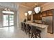 Community kitchen with granite counters and bar seating at 8269 Enclave Way # 103, Sarasota, FL 34243