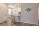 Modern kitchen with white cabinets, granite counters, and stainless steel appliances at 8269 Enclave Way # 103, Sarasota, FL 34243