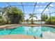 Relaxing screened pool and spa with lake view at 12721 Fontana Loop, Bradenton, FL 34211