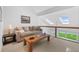 Relaxing loft area featuring a comfortable couch and a view at 24 Tidy Island Blvd # 24, Bradenton, FL 34210