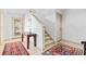 Inviting entryway with staircase and decorative rugs at 24 Tidy Island Blvd # 24, Bradenton, FL 34210