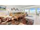 Relaxing living room with sectional sofa, water views, and ample natural light at 24 Tidy Island Blvd # 24, Bradenton, FL 34210