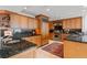 Modern kitchen with granite countertops, stainless steel appliances, and ample cabinetry at 24 Tidy Island Blvd # 24, Bradenton, FL 34210
