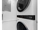 Modern laundry room with stacked washer and dryer at 24 Tidy Island Blvd # 24, Bradenton, FL 34210