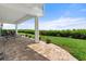 Relaxing patio area with brick pavers and lawn at 24 Tidy Island Blvd # 24, Bradenton, FL 34210