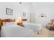 Small bedroom with twin beds and built-in shelving at 24 Tidy Island Blvd # 24, Bradenton, FL 34210