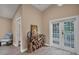 Bright living room with hardwood floors and access to a deck at 5169 Oxford Dr, Sarasota, FL 34242