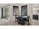 Breakfast nook with table and chairs near sliding glass doors at 5514 69Th E Pl, Ellenton, FL 34222