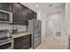 Kitchen with stainless steel appliances and granite countertops at 5514 69Th E Pl, Ellenton, FL 34222