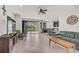 Open living area with tile floors, sliding glass doors, and access to the backyard at 5514 69Th E Pl, Ellenton, FL 34222