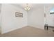 An entryway with tile flooring and a view into another room at 5514 69Th E Pl, Ellenton, FL 34222