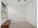 A bedroom with carpeted floor and a wooden chest at 5514 69Th E Pl, Ellenton, FL 34222