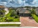 Beautiful home with a three-car garage and lush landscaping at 5514 69Th E Pl, Ellenton, FL 34222