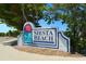 Siesta Beach community entrance sign at 3413 Clark Rd # 114, Sarasota, FL 34231