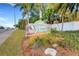 Sienna Park community entrance sign with landscaping at 3413 Clark Rd # 114, Sarasota, FL 34231