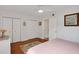 Bright bedroom with double closets and wood flooring at 3413 Clark Rd # 114, Sarasota, FL 34231