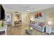 Living room with tiled floors, sofa and TV at 3413 Clark Rd # 114, Sarasota, FL 34231