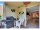 Patio with grill, seating, and access to the interior at 3413 Clark Rd # 114, Sarasota, FL 34231