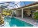 Stunning pool and patio oasis with screened enclosure and lounge area at 4735 Cassio Ct, Bradenton, FL 34211