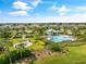 Resort-style pool with lounge chairs and cabanas at 4735 Cassio Ct, Bradenton, FL 34211