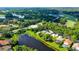 Aerial view showcasing home's location near water and golf course at 7217 Churston Ln, University Park, FL 34201