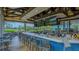 Outdoor bar with a view of the golf course and water at 7217 Churston Ln, University Park, FL 34201
