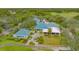 Community clubhouse with outdoor seating and golf course view at 7217 Churston Ln, University Park, FL 34201