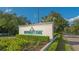 University Park community entrance sign with landscaping at 7217 Churston Ln, University Park, FL 34201