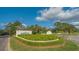 University Park community entrance with lush landscaping at 7217 Churston Ln, University Park, FL 34201