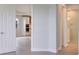 Open hallway with views into the kitchen and bathroom at 10748 Klee Ave, Bradenton, FL 34212