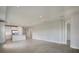 Open living room with tile floors and adjacent to kitchen at 10748 Klee Ave, Bradenton, FL 34212