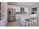 Well-equipped community kitchen with an island at 10748 Klee Ave, Bradenton, FL 34212