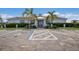 Community clubhouse with parking in front at 10748 Klee Ave, Bradenton, FL 34212