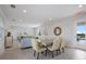 Bright and airy community room with dining and seating areas at 10748 Klee Ave, Bradenton, FL 34212