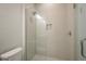 Bathroom with a large glass shower and neutral tile at 10748 Klee Ave, Bradenton, FL 34212