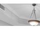 Elegant light fixture in a condo dining room at 393 N Point Rd # 503, Osprey, FL 34229