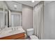 Clean bathroom with shower and wood vanity at 393 N Point Rd # 503, Osprey, FL 34229