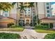 Elegant condo building entrance with fountain at 393 N Point Rd # 503, Osprey, FL 34229