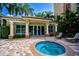 Community hot tub with lounge chairs and access to the clubhouse at 393 N Point Rd # 503, Osprey, FL 34229