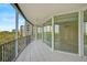 Spacious balcony with tiled floor and scenic views at 393 N Point Rd # 503, Osprey, FL 34229