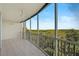 Covered balcony offering scenic water views at 393 N Point Rd # 503, Osprey, FL 34229